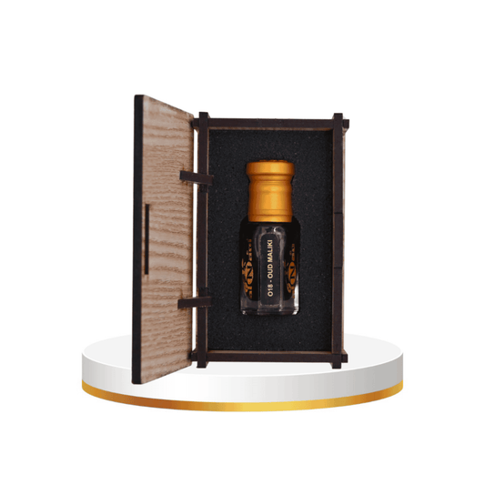 Arabian fragrances featuring rich oud notes in a luxurious traditional perfume oil