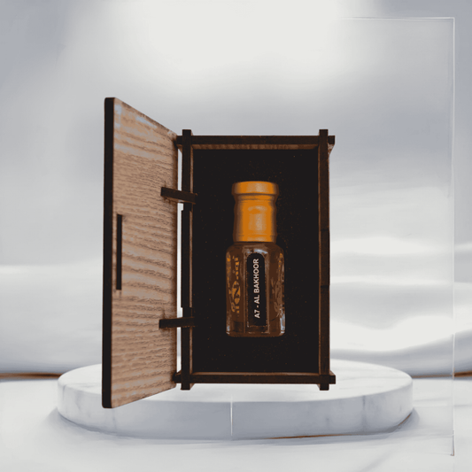 Elegant bottle of Bhakoor Attar with intricate design details.
