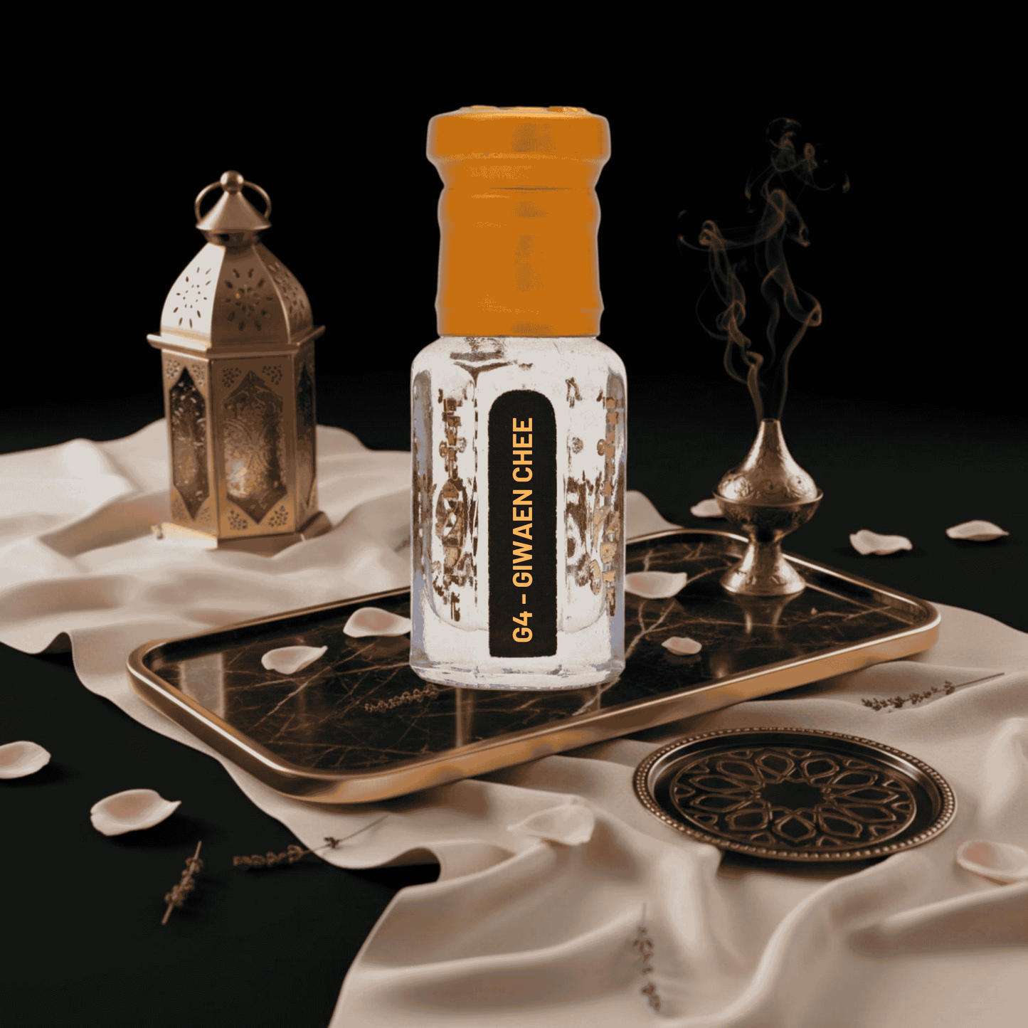 Hand holding a luxurious perfume bottle with floral accents