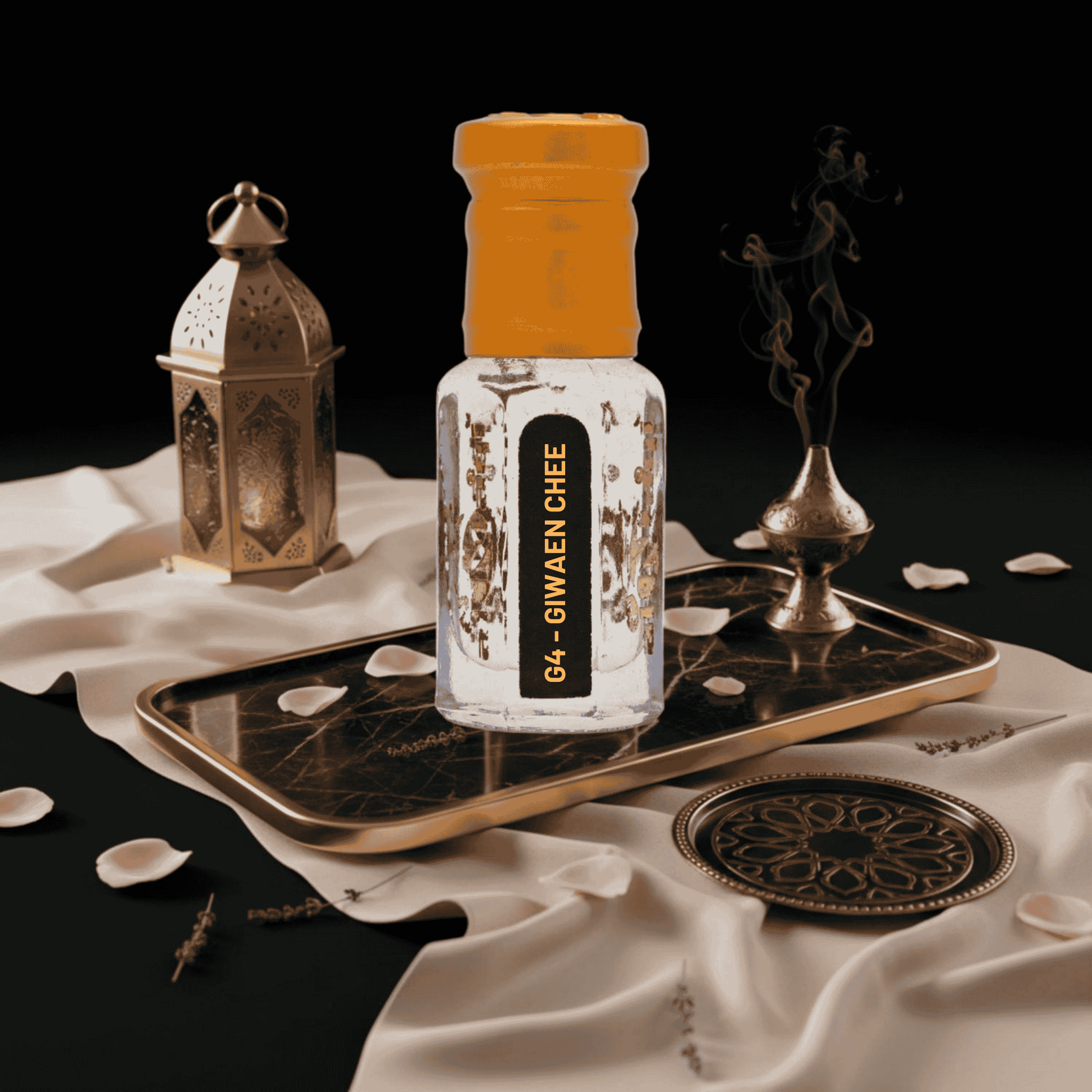 Hand holding a luxurious perfume bottle with floral accents
