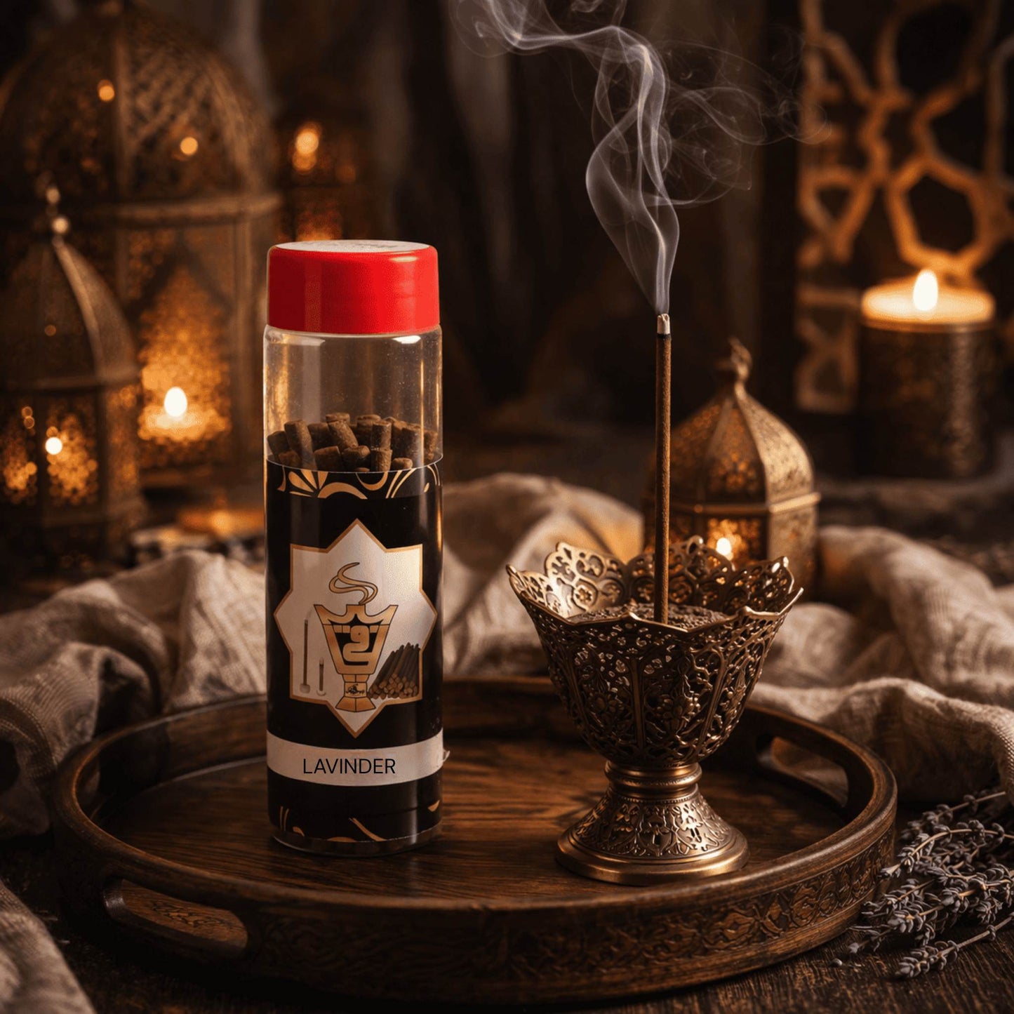 Incense bottle with a red cap on a wooden tray with incense burning, surrounded by candles and lanterns.