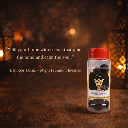 Bottle of Bakhoor Dania incense with a warm, blurred background