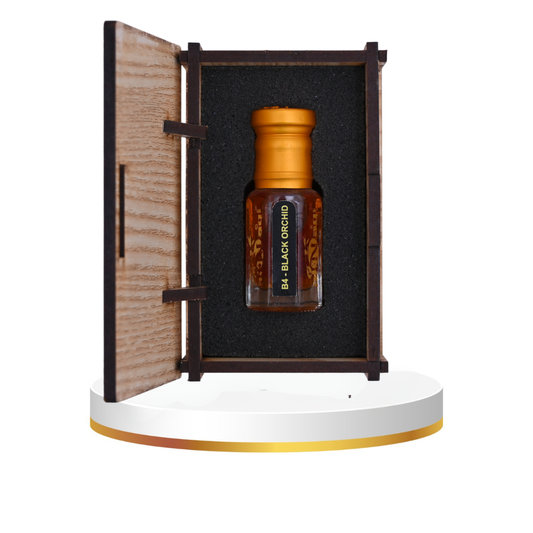 Close-up view of rich, deep amber fragrance in a sleek container