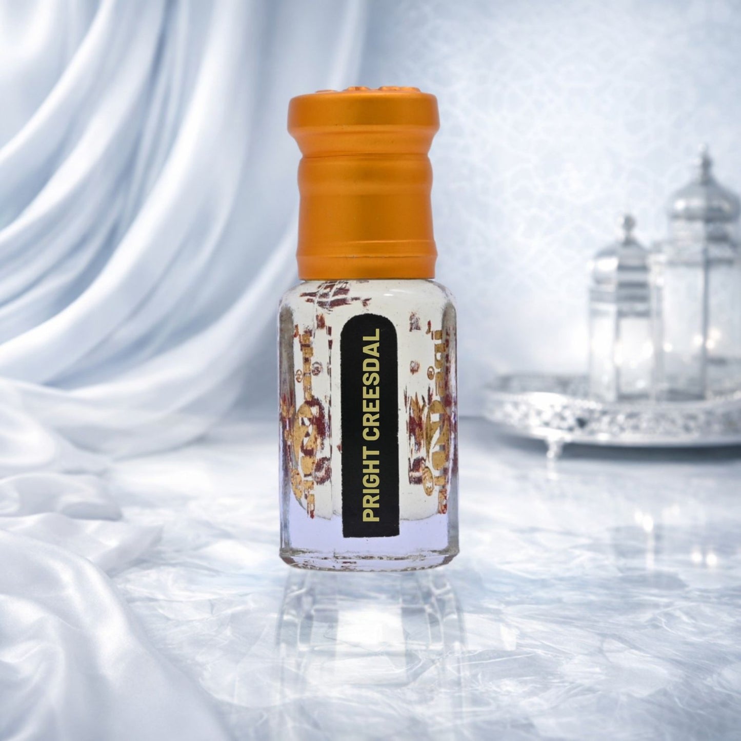 Attar packaging with intricate design placed on a dark background