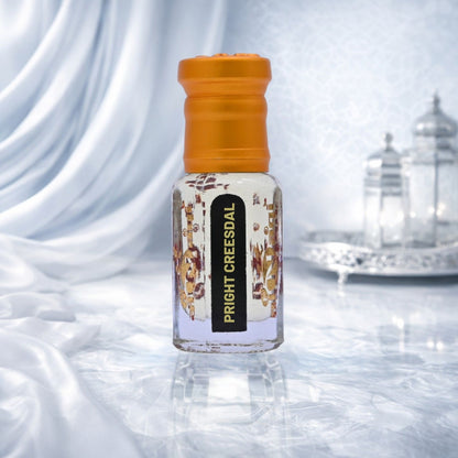 Attar packaging with intricate design placed on a dark background