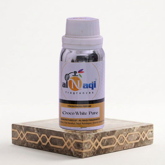 Bottle of Al-Naqi Croco White Pure perfume on a decorative stand with a white background