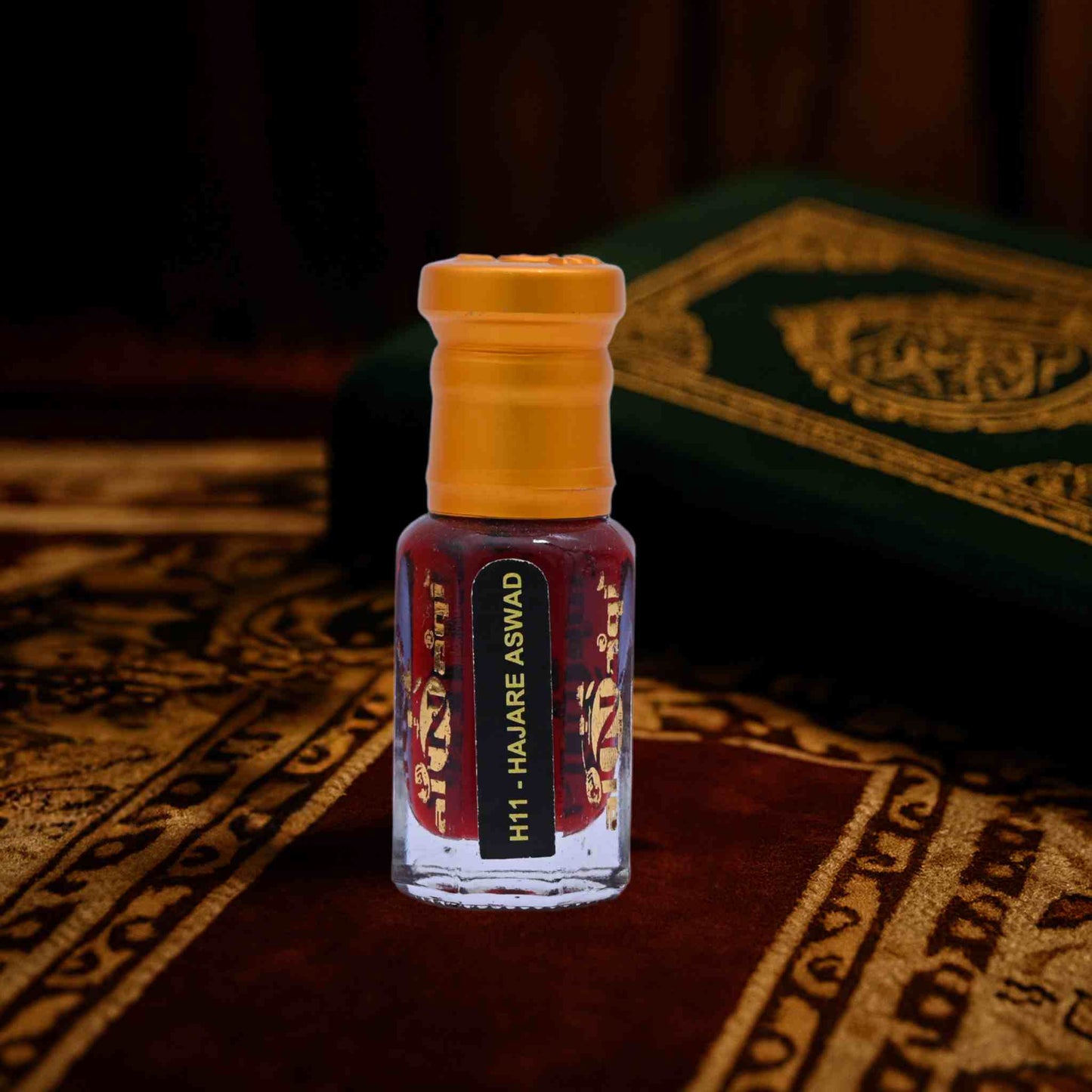 Small bottle with yellow cap on a patterned surface