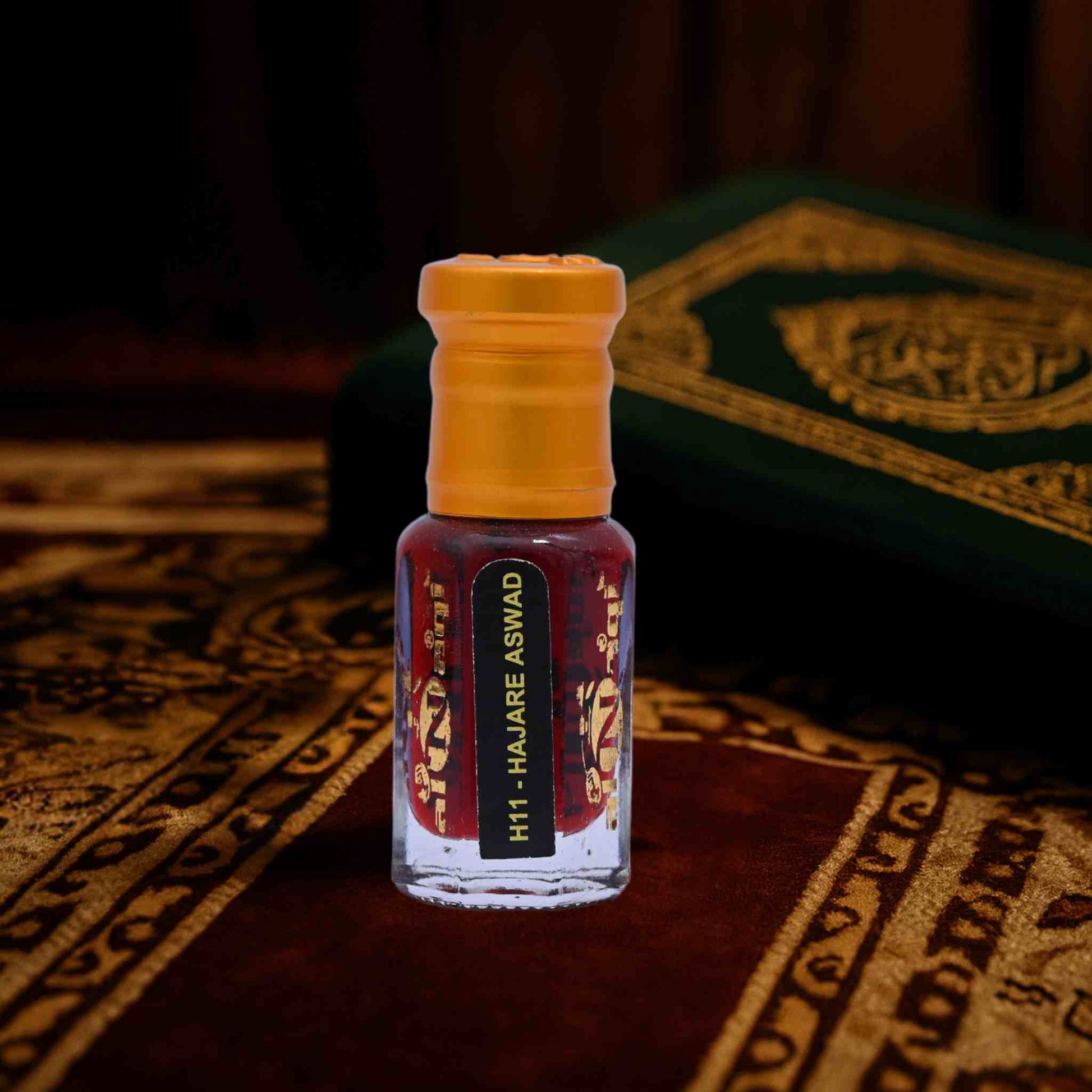 Small bottle with yellow cap on a patterned surface