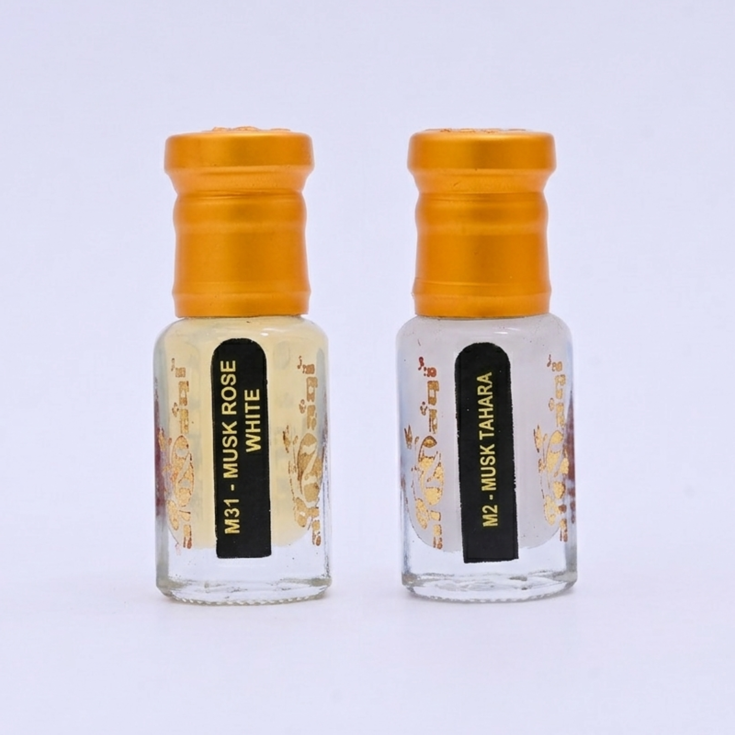 Musk Rose White and Musk Tahara halal attar oil combo set in glass bottles with gold caps