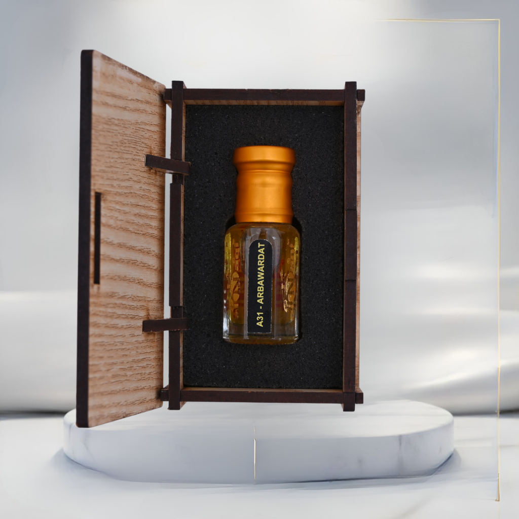 Close-up of the elegant Arba Vardat attar bottle with intricate design details.