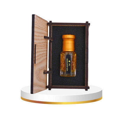 Wooden box with a glass bottle inside on a white background