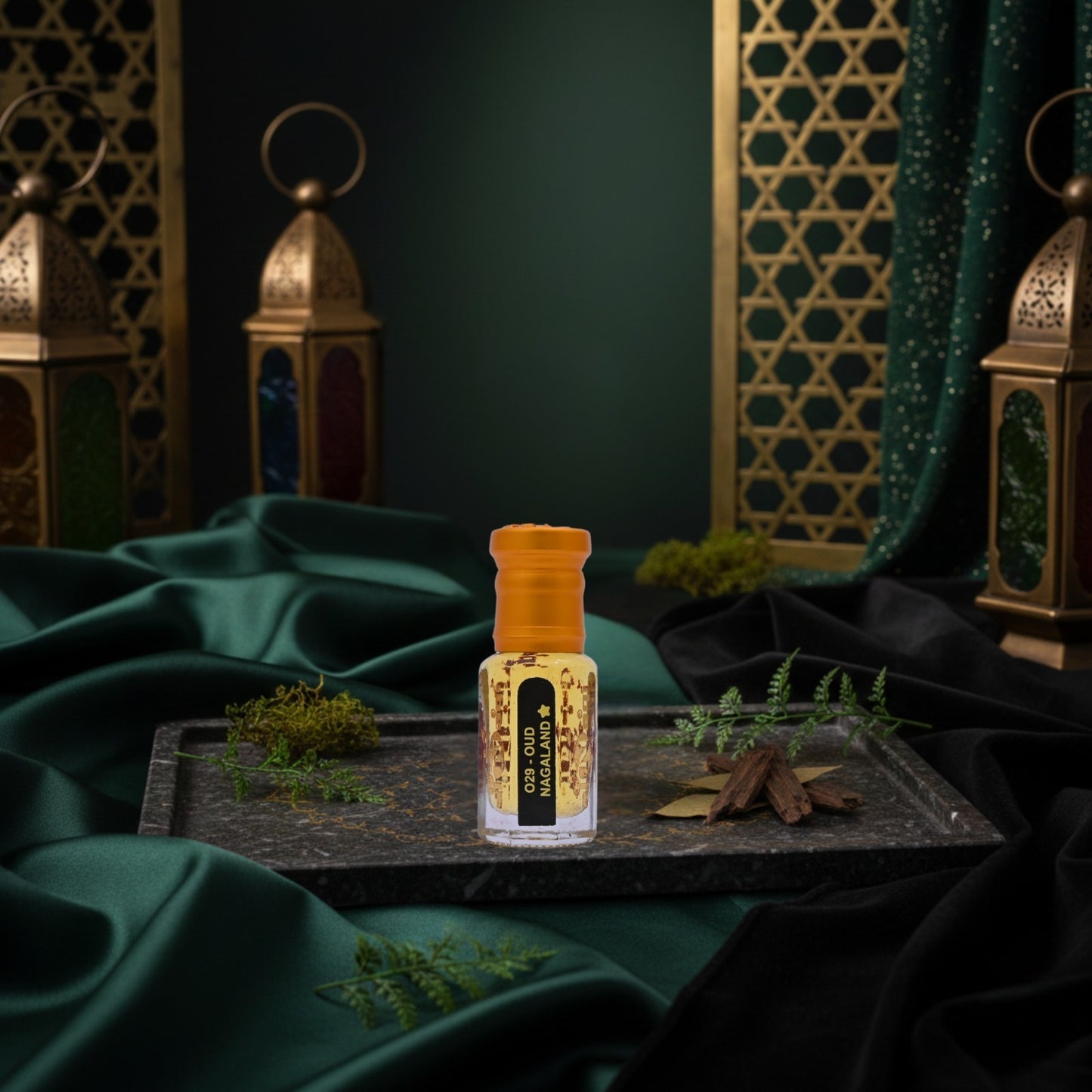 Perfume bottle with decorative lanterns and green fabric in the background