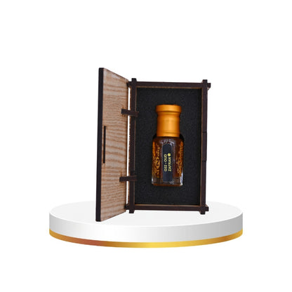 Bottle of Jack Daniel's whiskey in a wooden display case on a white platform.