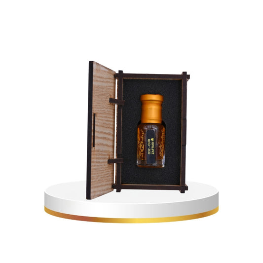 Bottle of Jack Daniel's whiskey in a wooden display case on a white platform.