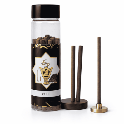 Incense sticks in a cylindrical container with a black lid and decorative label on a white background.