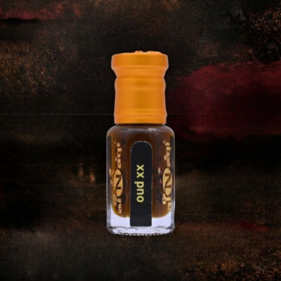 Small bottle with yellow cap and black label on a dark textured background
