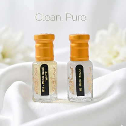Pure clean musk attar oil in mini glass roller bottles with gold ornate label