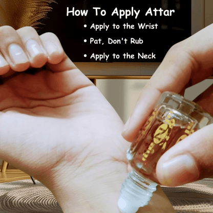 Hand holding a small bottle of attar with text on how to apply it.