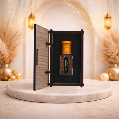 Glass perfume vial showcasing rich amber-colored oil