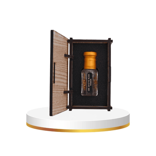 Small bottle with gold cap on a wooden stand with 'al Naqi' branding.
