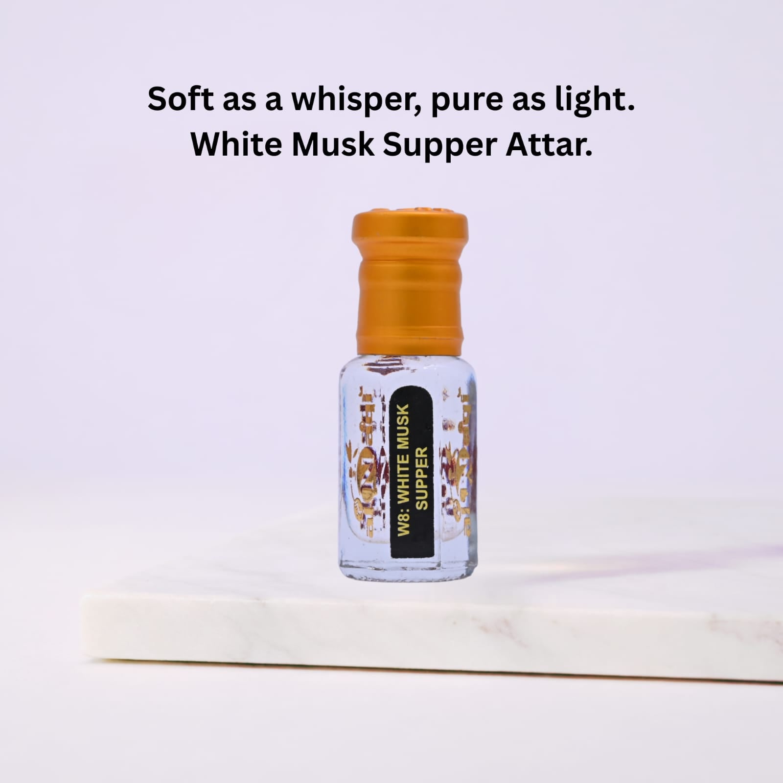 White Musk Supper Attar bottle with text on a light background